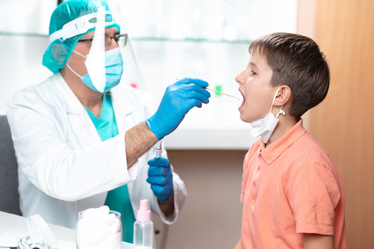Child getting a doctor exam at pediatric walk-in in Clearwater.